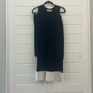 Very flattering, open shoulder dress.